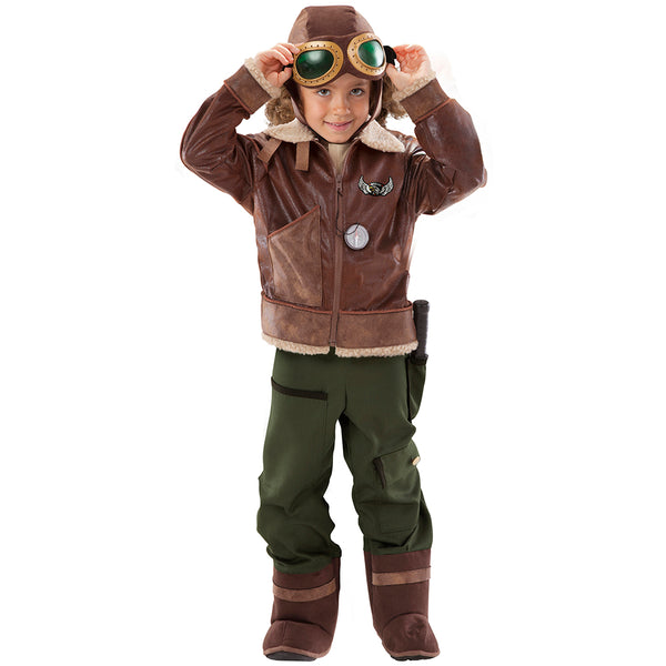 Little girl in Kid's aviator costume with brown jacket and green pants grabbing the toy goggles on her head.