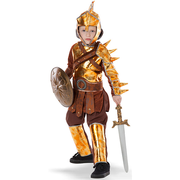 Little boy wearing kids costume of a roman gladiator in gold with shield, sword, and helmet.
