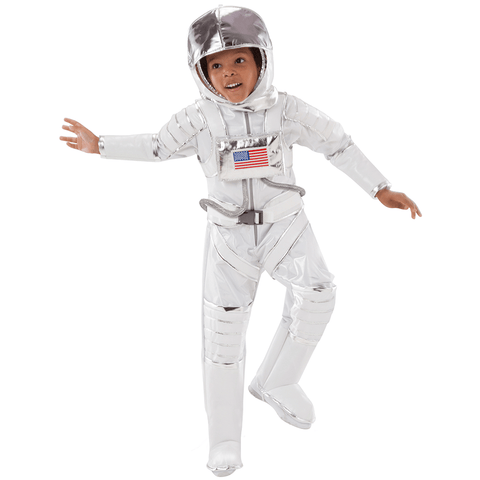 Child wearing a white Teetot brand  Astronaut children's costume with attached air hoses and silver sewn helmet in a pose as if he's floating.